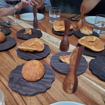 ALTO Fire to Table - Torta Fritas and Chipas with Cashew butter (brown one with flowers), and tomato butter coatted with buckwheat seeds. Plating was exceptional - Latin American Near Me - Studio City, California ALTO Fire to Table - Torta Fritas and Chipas with Cashew butter (brown one with flowers), and tomato butter coatted with buckwheat seeds. Plating was exceptional - Latin American Near Me - Studio City, California