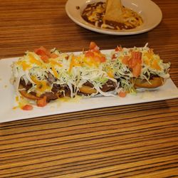Golden Grill Restaurant - Indian fry bread tacos with shredded beef, refried beans, cheese, lettuce, tomatoes...very good.  The extra side dish refried beans.
