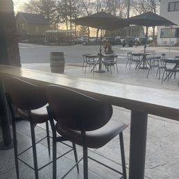 Outdoor seating from the bar of the hotel looking out towards the lake during sunset