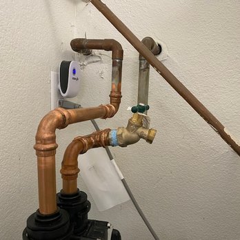 De Anza Water Conditioning - Expert plumbing working by De Anza Water Conditioning. Note the hose spigot (so I can attach a hose to and wash my car with soft water). - Water Purification Services Near Me - Campbell, California De Anza Water Conditioning - Expert plumbing working by De Anza Water Conditioning. Note the hose spigot (so I can attach a hose to and wash my car with soft water). - Water Purification Services Near Me - Campbell, California