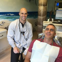 Kremer Dental Care - Dr. Mckinney and patient