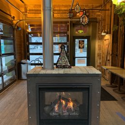 The main room of the coffee shop had the fireplace on and was decorated for the holiday.