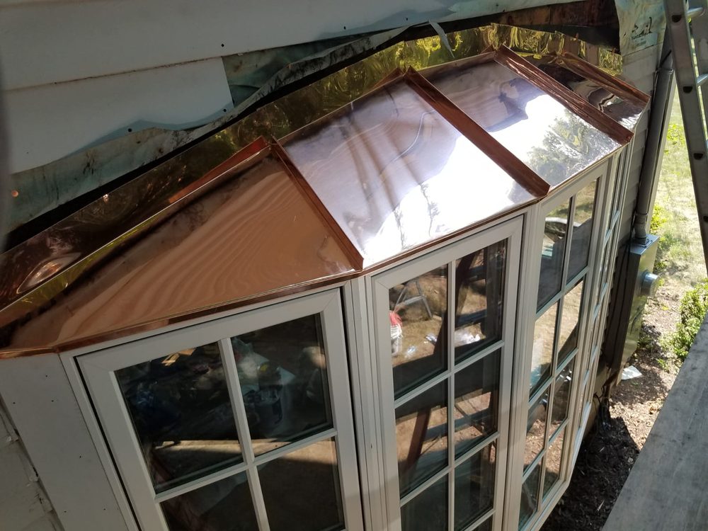 Slide of E&F Roofing