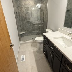 Kitchen Bath & Beyond - Hall bath shower area. (There was a tub in that space)