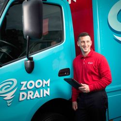 Zoom Drain South Shore - Technician ready to service a neighborhood near you. Drains, Sewers, Pipes, Service