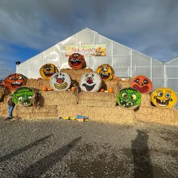 a hay bale filled with halloween decorations