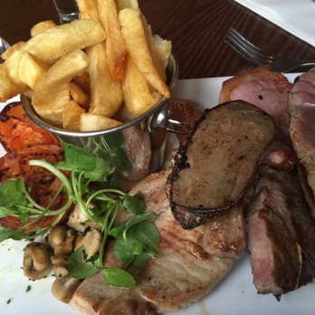 The Dog & Doublet - A fine mixed grill with steak cooked rare and extra blue cheese sauce - Pubs Near Me