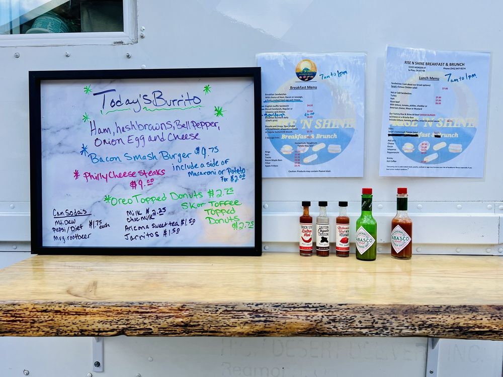 Rise N Shine Breakfast And Brunch Logo