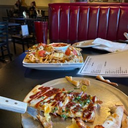 BBQ chicken pizza and Italian nachos BBQ chicken pizza and Italian nachos