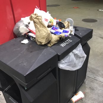 Sheetz - a black trash can with a brown bag on top of it - Convenience Stores Near Me - Wilkes Barre, Pennsylvania