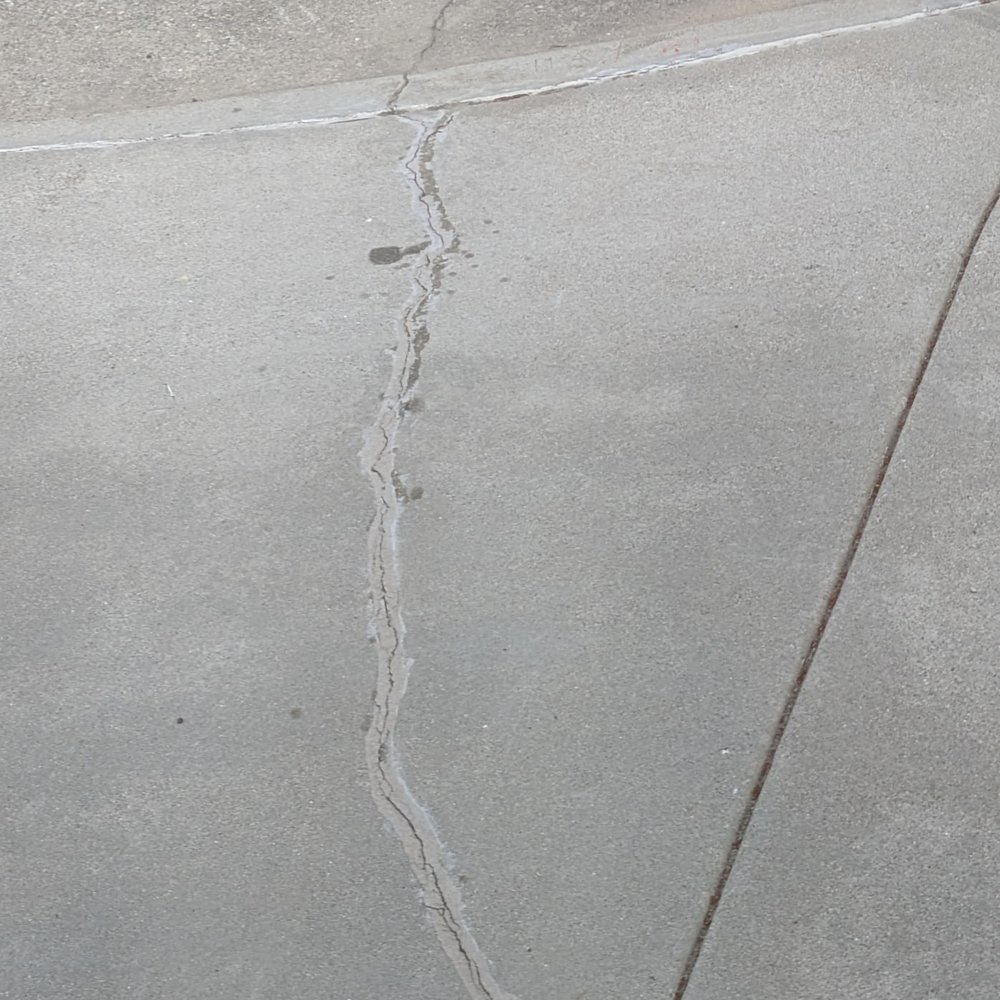Oil left from Luciano's truck, after the surface had just been cleaned! Oil left from Luciano's truck, after the surface had just been cleaned!