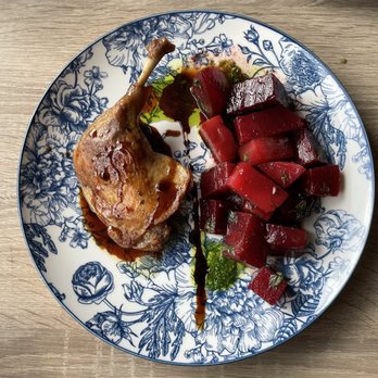 The Kitchen - Duck leg confit with amarena cherry gastric ($17.00) and marinated organic beets and mint-balsamic vinaigrette ($9.00) - Basque Near Me - Penticton, British Columbia The Kitchen - Duck leg confit with amarena cherry gastric ($17.00) and marinated organic beets and mint-balsamic vinaigrette ($9.00) - Basque Near Me - Penticton, British Columbia
