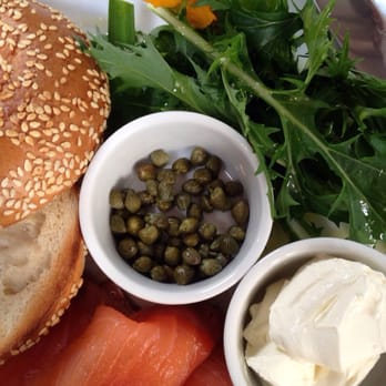 Soulshine Café - Montreal style bagels: The soulshine bagel with salmon, cream cheese, capers, salad and chips - Juice Bars & Smoothies Near Me - Bridport, DOR