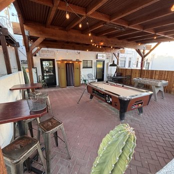 SBR 29 - The outdoor pool table, foosball shuffleboard, Photo Booth and TV area - Burgers Near Me - Twentynine Palms, California