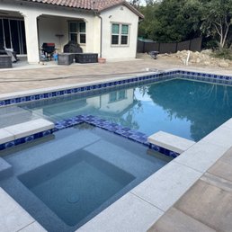 Pavers, French Gray pebble tech and Casablanca/royal blue tile Pavers, French Gray pebble tech and Casablanca/royal blue tile