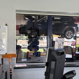 A car before me, up on the lift for 30 minutes. Oil change A car before me, up on the lift for 30 minutes. Oil change