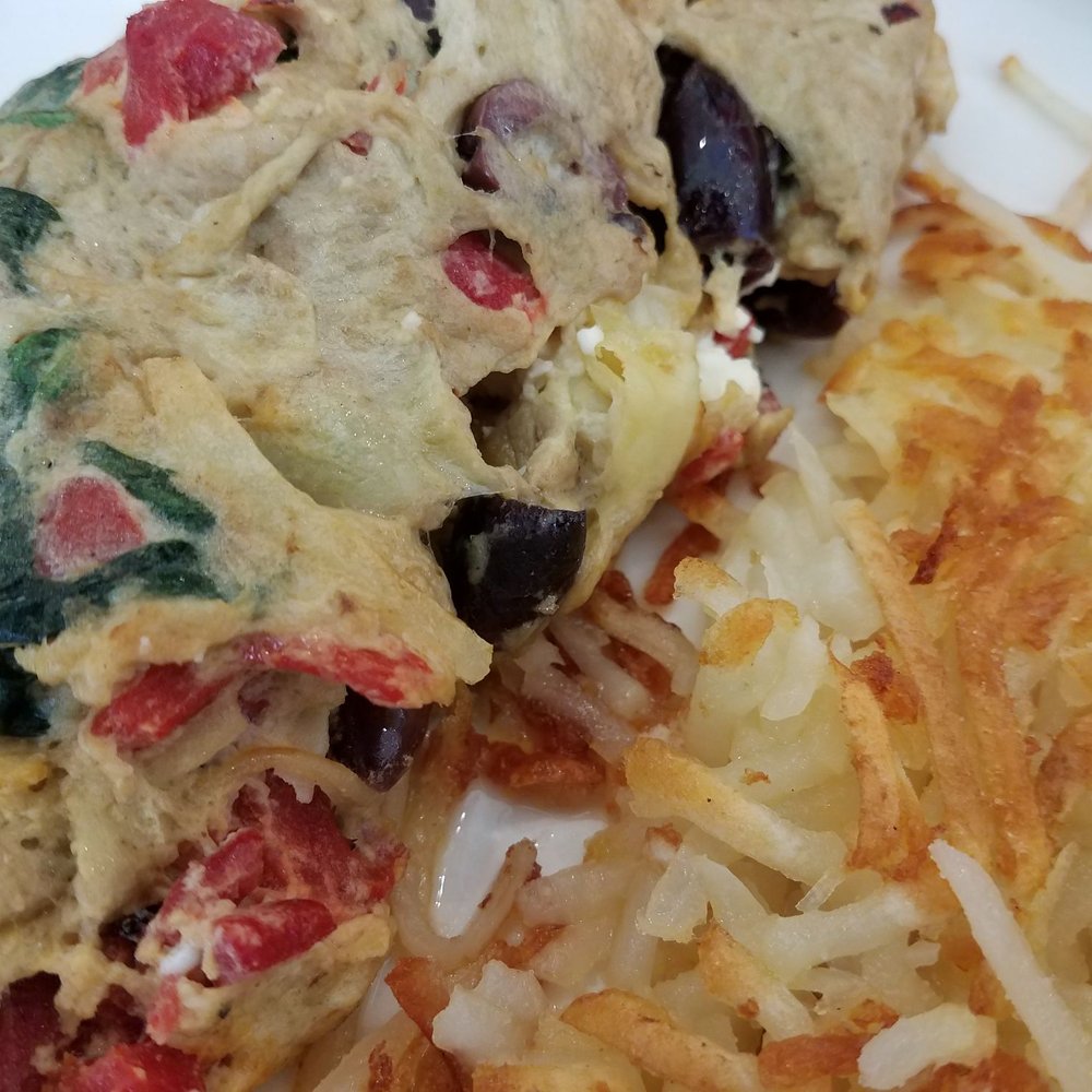 Eggsquisite Cafe - Omelet with artichoke hearts tomatoes and feta. - Breakfast & Brunch Near Me - McKinney, Texas Eggsquisite Cafe - Omelet with artichoke hearts tomatoes and feta. - Breakfast & Brunch Near Me - McKinney, Texas