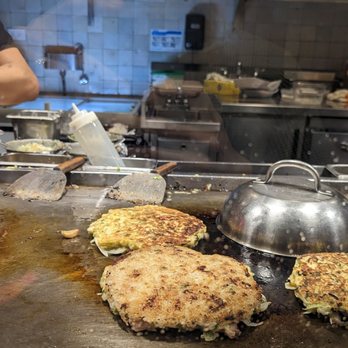 Gaijin - Okonomiyaki getting prepared - Japanese Near Me - Chicago, Illinois