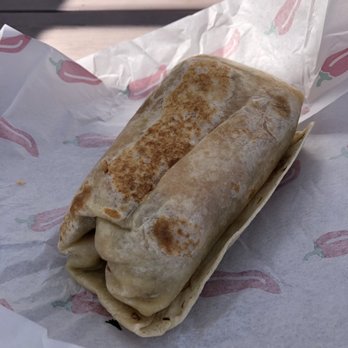 Tacos Dos Hermanos - a burrito wrapped in paper - Mexican Near Me - Ontario, Oregon Tacos Dos Hermanos - a burrito wrapped in paper - Mexican Near Me - Ontario, Oregon