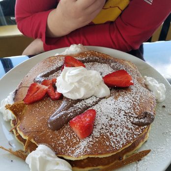 Emle's Restaurant - The Chocolate Nut pancake. Extreme yummiest! Two huge pancakes filled with Nutella. Fresh strawberries and whipped cream on top. - American Near Me - Northridge, California Emle's Restaurant - The Chocolate Nut pancake. Extreme yummiest! Two huge pancakes filled with Nutella. Fresh strawberries and whipped cream on top. - American Near Me - Northridge, California