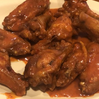 City Wings - a plate of chicken wings with sauce - Chicken Wings Near Me - Cartersville, Georgia City Wings - a plate of chicken wings with sauce - Chicken Wings Near Me - Cartersville, Georgia