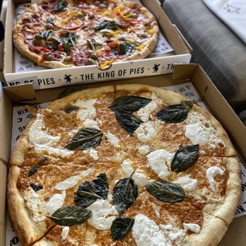Coniglio’s Old Fashioned - round vodka stracciatella and salsiccia pepper onion pizzas - Pizza Near Me - Morristown, New Jersey Coniglio’s Old Fashioned - round vodka stracciatella and salsiccia pepper onion pizzas - Pizza Near Me - Morristown, New Jersey