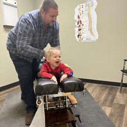 New Era Chiropractic - Asher loves to be adjusted!!