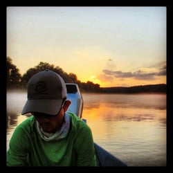Dally's Ozark FlyFisher - Guide Chad Johnson in his office on The White River. Evening hopper float.