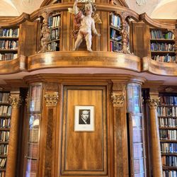 Hotel Schloss Leopoldskron - My favorite part of the palace: the library. Secretly door to the right of the photo of former owner Max Reinhardt on the wall.