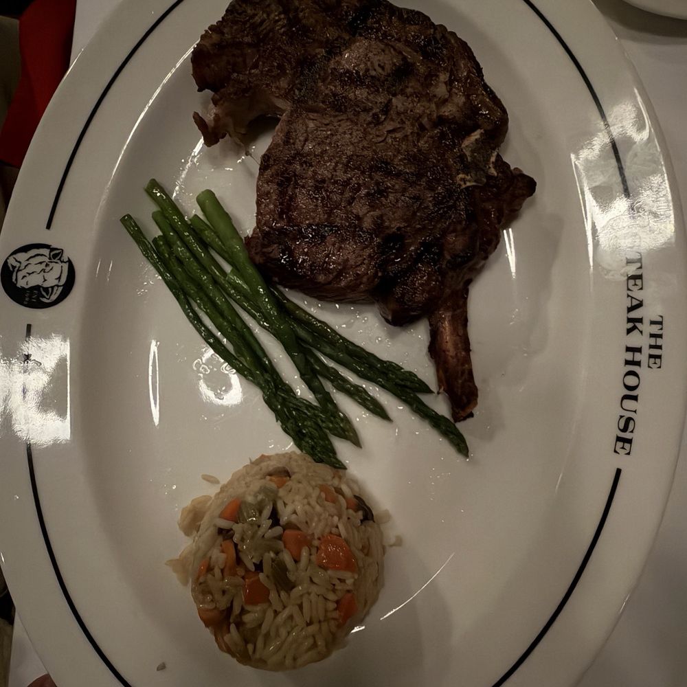THE Steak House - Rib-eye steak and rice pilaf - Steakhouses Near Me - Las Vegas, Nevada THE Steak House - Rib-eye steak and rice pilaf - Steakhouses Near Me - Las Vegas, Nevada