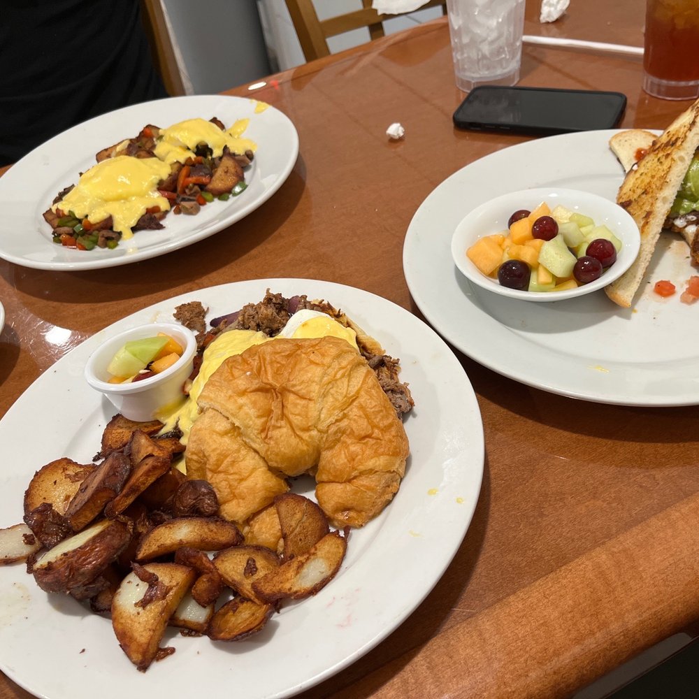 Peach Valley Cafe - two plates of food on a table - Breakfast & Brunch Near Me - Maitland, Florida Peach Valley Cafe - two plates of food on a table - Breakfast & Brunch Near Me - Maitland, Florida
