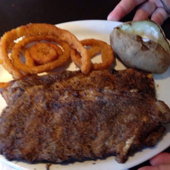 Ruby Tuesday Moanalua - Full rack with baked potato side and onion rings! - American Near Me - Honolulu, Hawaii Ruby Tuesday Moanalua - Full rack with baked potato side and onion rings! - American Near Me - Honolulu, Hawaii