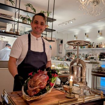 Tourmaline - Chef Yvan proudly displaying this Labor of Love - Steel Pressed Duck - New American Near Me - Forest Hills, New York