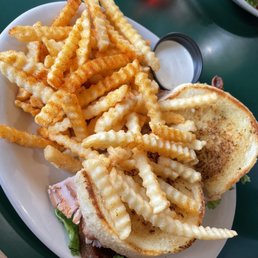 Club sandwich and fries