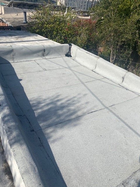 Slide of M R Roofing