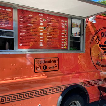 El Alambre - an orange food truck parked in a parking lot - Mexican Near Me - San Francisco, California El Alambre - an orange food truck parked in a parking lot - Mexican Near Me - San Francisco, California