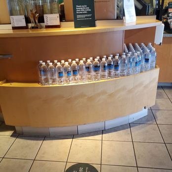 Starbucks - a display of bottled water bottles - Coffee & Tea Near Me - Plantation, Florida