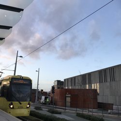 Deansgate-Castlefield Metrolink - Tram pulling in at Deansgate-Castlefield Metrolink Station heading towards Shaw via Exchange Square (city center)