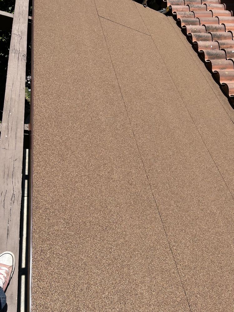 Slide of Over & Above Roofing