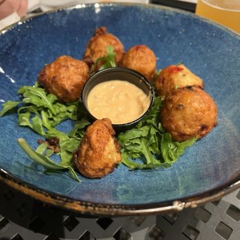 Outback Crab Shack - Conch fritters - so good! (We had eaten a couple! Sorry!) - Seafood Near Me - Saint Augustine, Florida Outback Crab Shack - Conch fritters - so good! (We had eaten a couple! Sorry!) - Seafood Near Me - Saint Augustine, Florida
