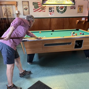 Kwazy Wabbit - a man playing pool - Bars Near Me - Ely, Minnesota