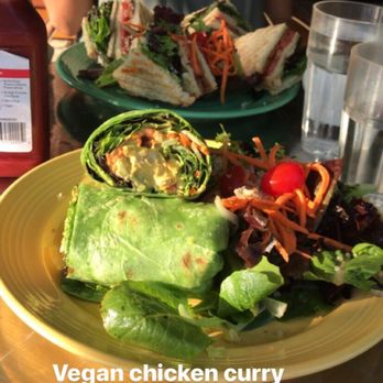 The Grain Cafe - Chicken Curry Wrap in the foreground with Club Sandwich behind - Vegan Near Me - Long Beach, California
