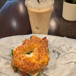 Spinach, Brie, bacon, and egg on an asiago bagel - so delicious! Enjoyed in a quiet nook area made it even better!