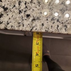 Coastal Granite & Marble - Did not measure reveal to ensure top was square.
