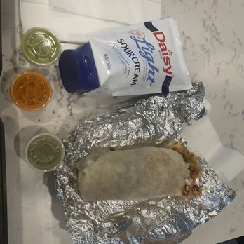 Taqueria Chatita - Kids chicken burrito, sour cream used for scale - Mexican Near Me - Poulsbo, Washington Taqueria Chatita - Kids chicken burrito, sour cream used for scale - Mexican Near Me - Poulsbo, Washington
