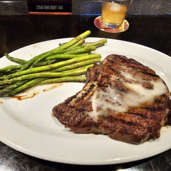 LongHorn Steakhouse - Outlaw ribeye with asparagus - Steakhouses Near Me - Commerce, Georgia