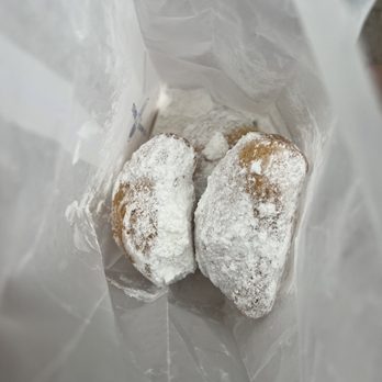 Bayou Bakery, Coffee Bar & Eatery - two powdered donuts in a plastic bag - Bakeries Near Me - Arlington, Virginia Bayou Bakery, Coffee Bar & Eatery - two powdered donuts in a plastic bag - Bakeries Near Me - Arlington, Virginia