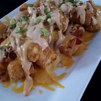 Pub 819 - "Tachos" with added beer cheese. - Cocktail Bars Near Me - Hopkins, Minnesota Pub 819 - "Tachos" with added beer cheese. - Cocktail Bars Near Me - Hopkins, Minnesota