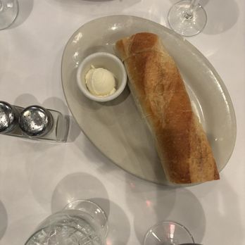 Tiramisu - Table bread, butter, wine and salad - Italian Near Me - Quincy, Illinois