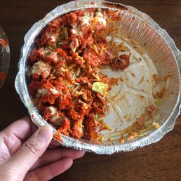 Chicken over rice, the platter is so big I can only half in one sitting Chicken over rice, the platter is so big I can only half in one sitting